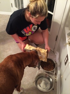 Even though Taylor is an only child, she does have a dog. When Taylor was 8 years old, she got Casey as a Christmas present and they have been best friends ever since. Being an only child is hard, but Taylor says it's a little bit easier having a pet around. Here Taylor is feeding Casey her dinner.